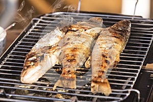 Fish perch baked at home on the grill