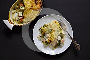 Fish pie with sliced potato topping