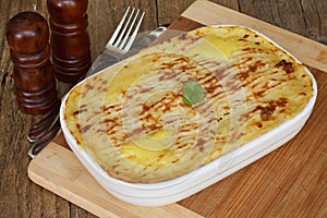 Fish pie on wooden table