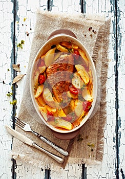 Fish and potatoes stewed in clay pot