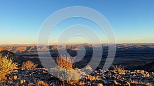 Fish River Canyon in Namibia. Grand Canyon in USA. Sunset time lapse.