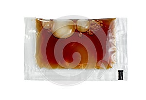 Fish sauce in plastic bag vacuum isolated on white background ,include clipping path