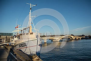 Fish seller and bike bridge in the harbor of Copenhagen. Denmark