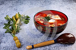 Fish solyanka - traditional russian soup with pickles.