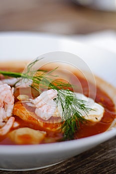 Fish soup with aioli sauce photo