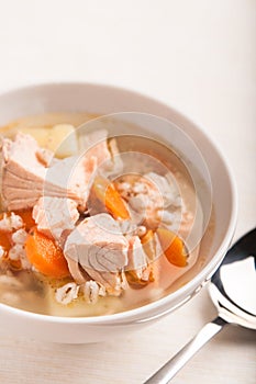 Fish soup with salmon and orge perlÃÂ© photo