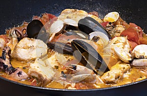 Fish soup with slices of toasted bread