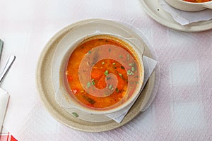 Fish soup on a table in restaurant. Top view