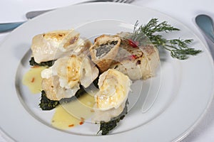 Fish and spinach a la carte meal photo