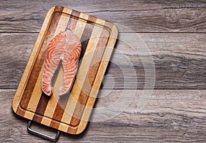 Fish steak on cutting board