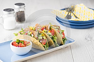 Fish tacos shell with avocado salsa