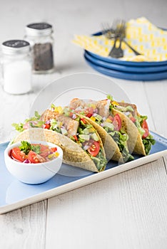 Fish tacos shell with avocado salsa