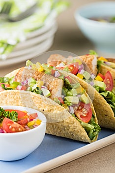 Fish tacos shell with avocado salsa