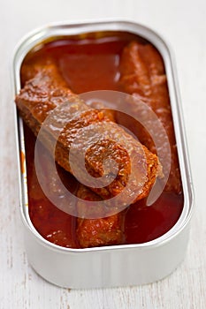 Fish in tomato sauce in iron box