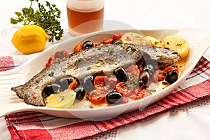 Fish with tomatoes and olives