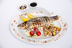 Fish, trout grill with vegetables and potatoes