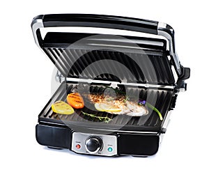 fish and vegetables on electric grill