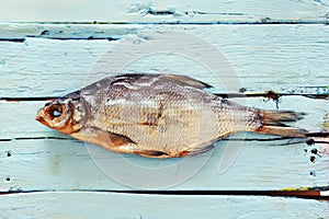 Fish on wooden background