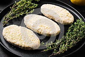 Fishcake burger , on black wooden table background