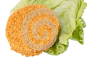 Fishcake burger on salad