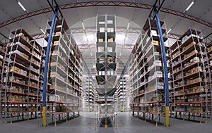 Fishe eye view of the modern warehouse interior. Loaded settl storage racks