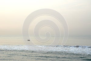 Fisher boat in the ocean bevore the african beach in benin
