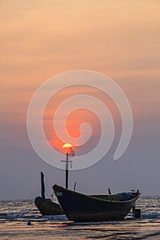 Fisher boat and sun set sky at kon aow had mae rumpung rayong ea