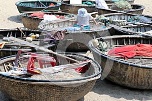 Fisher repairs his nets - Hoi An - Vietnam photo