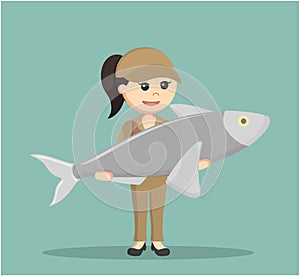 Fisher woman standing with big fish