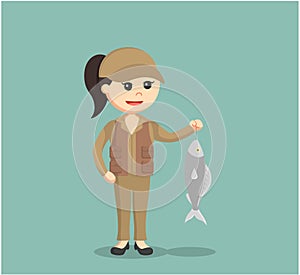 Fisher woman standing with fish