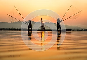 Fisherman in action when fishing in the lake