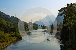 Fisherman on bamboo rafts