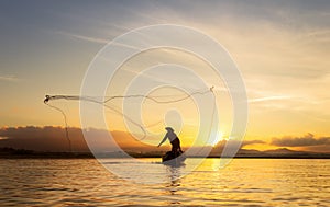 Fisherman of Bangpra Lake in action when fishing