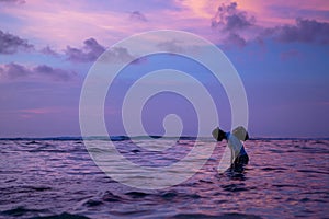 Fisherman with basket in Bali
