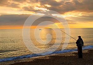 Fisherman on beach