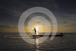 Fisherman with beautiful sunrise