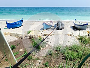 Fisherman boat ashore on the beach