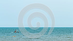 Fisherman boat in beautiful calm sea