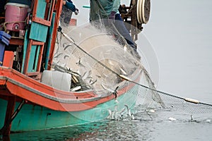 On the fisherman boat, Catching many fish