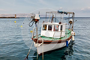 Fisherman Boat Docked at Harbor in Senj