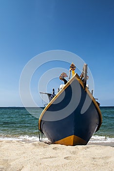 Fisherman Boat Parked at Beach Shore