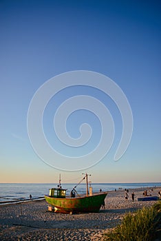 fisherman boats at sunrise time on the beach