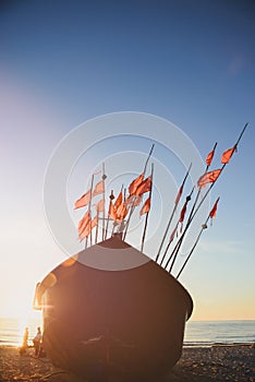 fisherman boats at sunrise time on the beach