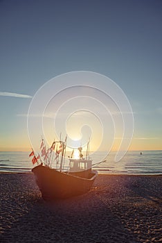 fisherman boats at sunrise time on the beach