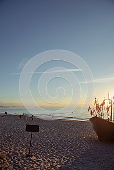 fisherman boats at sunrise time on the beach