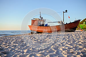 fisherman boats at sunrise time on the beach