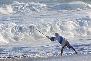 Fisherman casting off