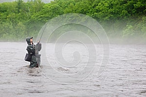 Fisherman caught a salmon river