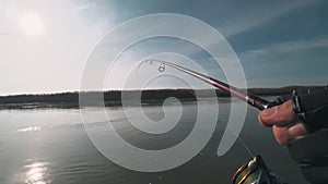 Fisherman caught on a spinning predatory zander