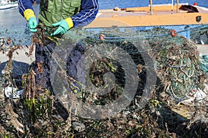Repairing fishing nets photo